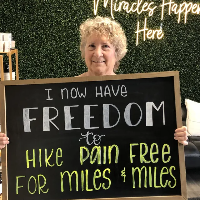 Legacy patient sharing newfound freedom on a chalkboard