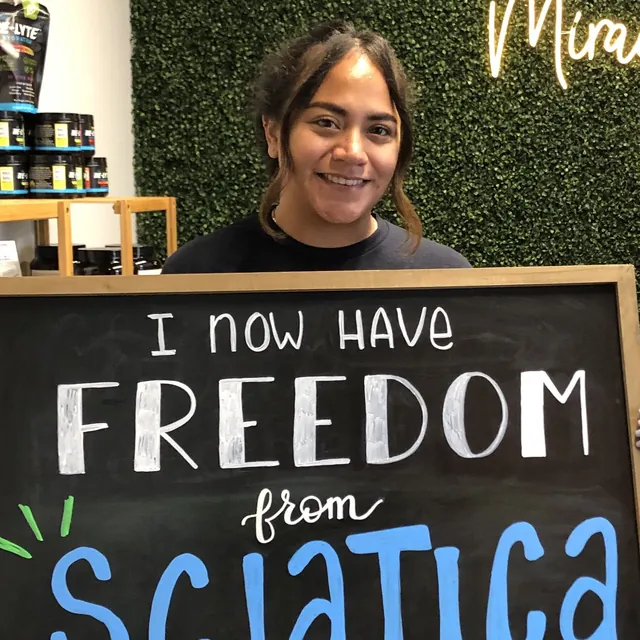 Legacy Family Chiropractic patient sharing a chalkboard health story